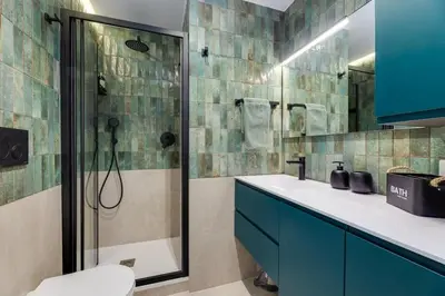 a bathroom with a shower and a sink and a toilet at Casa Anacapri in Rome