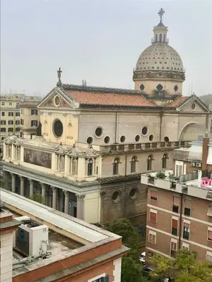 a large building with a dome on top of it at Ezio29 Holiday House in Rome
