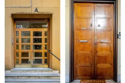 a door to a building with stairs in front at Roma centro Vicino al Vaticano - Free WiFi in Rome