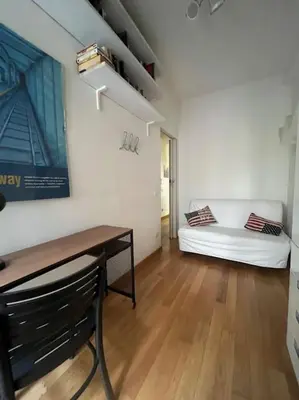 a room with a couch and a bed in a room at My Home in Rome in Rome