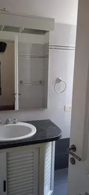 a bathroom with a sink and a mirror at InsideRome Appartamento Vaticano e Centro Storico in Rome