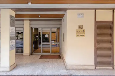 an entrance to a building with a revolving door at Sangió - Lovely Home in Rome in Rome