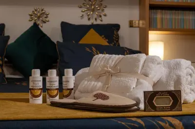 a pile of towels and products on a bed at Navona Sweet Loft in Rome