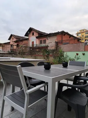 a table and chairs sitting on top of a roof at Appartamento Prenestina 74 in Rome