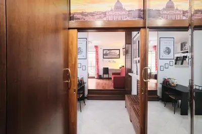 a door leading into a room with a living room at Trastevere luxury apartment in Rome