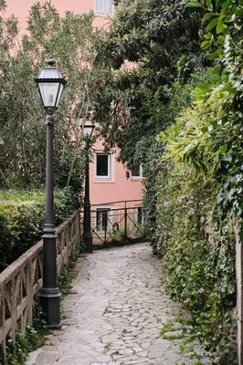 a street light in front of a pink building at Trastevere luxury apartment in Rome