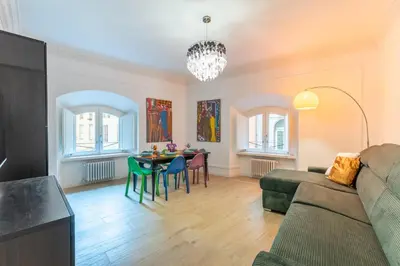 a living room with a couch and a table at Casa degli Dei in Rome