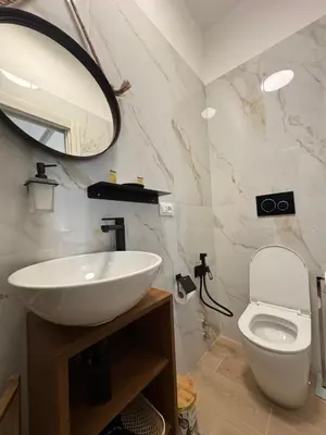 a bathroom with a sink and a toilet at NeW!The Place Vaticano 278 guest house in Rome