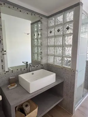 a bathroom with a white sink and a mirror at NeW!The Place Vaticano 278 guest house in Rome