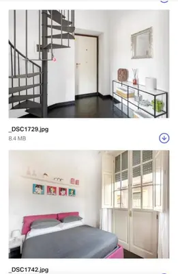 a bedroom with a staircase and a bedroom with a bed at Andreoli 2 apartment Rooftop in Rome