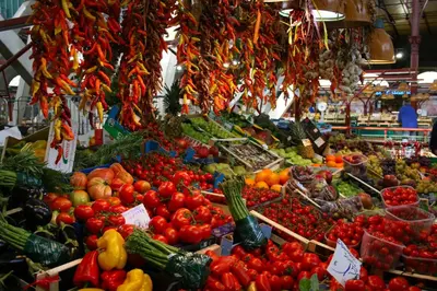 a market filled with lots of fruits and vegetables at Il Bacio Holidayhouse BEST LOCATION FOR VISIT THE VATICAN in Rome