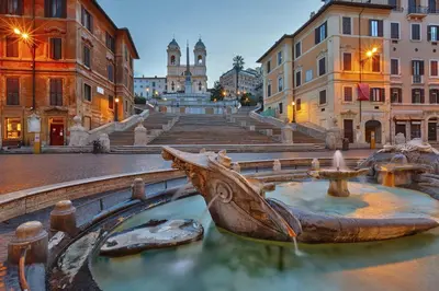 a fountain in the middle of a city with buildings at Il Bacio Holidayhouse BEST LOCATION FOR VISIT THE VATICAN in Rome