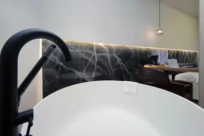 a room with a spiderweb on the wall at Roma Suite Major in Rome