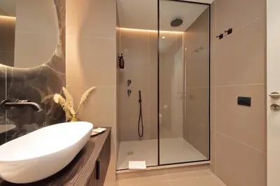 a bathroom with a sink and a shower at Roma Suite Major in Rome