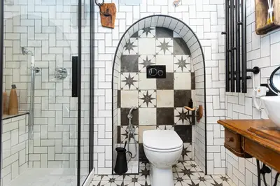 a bathroom with a toilet and a shower at Khris Home Apartments - Trastevere - San Cosimato in Rome