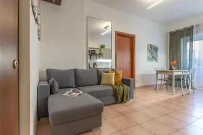 a living room with a couch and a table at Hope Home in Rome