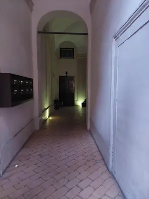 an empty hallway with a door in a building at La Dimora di Roma in Rome