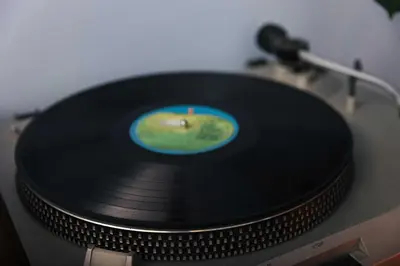 a vinyl record sitting on top of a stove at Lovely Sanctuary Central in Rome