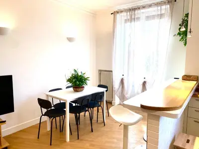 a kitchen and dining room with a table and chairs at A&G central stay in Rome