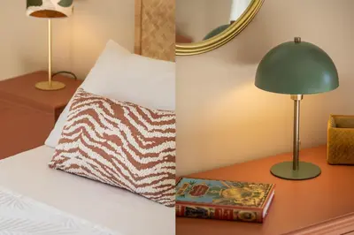 a bed with a pillow and a lamp on a table at Conca d'oro house in Rome