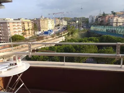 a balcony with a view of a city at VATICAN GUEST HOUSE ROOMS in Rome in Rome