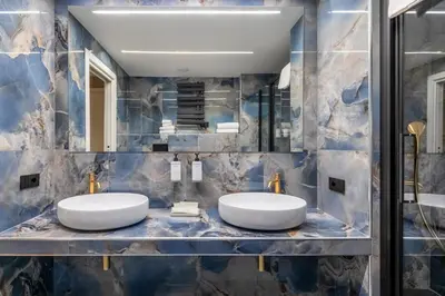two sinks in a bathroom with a mirror at Ara di Marte Home in Rome