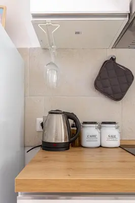 a tea kettle on a counter in a kitchen at LA DOLCE VITA - stone's throw from the city center in Rome