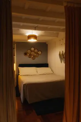a bedroom with a bed in a room at Restart Accommodations Lante in Rome