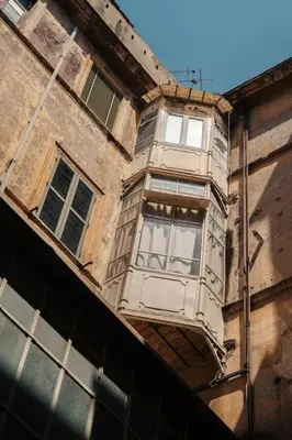 a window on the side of a building at Restart Accommodations Lante in Rome