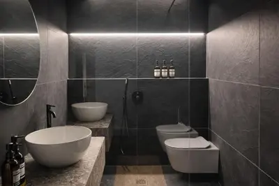 a bathroom with two sinks and two toilets in it at Vatican Boutique - 1 bedroom Apartment - Bilocale in Rome