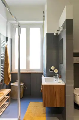 a bathroom with a sink and a toilet at Casa Porta Metronia in Rome