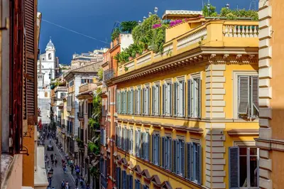 a view of a street in a city with buildings at The Inn at the Spanish Steps Luxury Collection - Suite Condotti in Rome