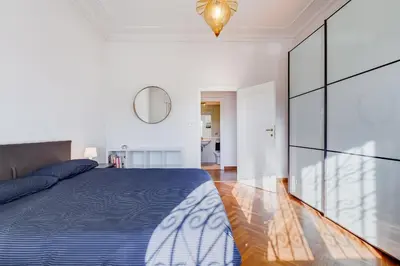 a bedroom with a bed and a glass wall at Chigi's Terrace in Rome