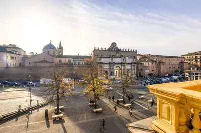 a view of a city with buildings and trees at Villa Borghese Apartment in Rome