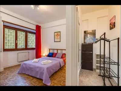 a bedroom with a bed in a room at L aROMA ANTICA in Rome