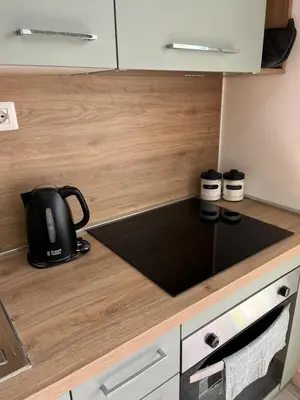 a kitchen with a tea kettle on a counter at Paolettas House in Rome