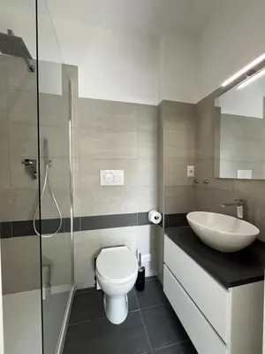 a bathroom with a toilet and a sink at Paolettas House in Rome