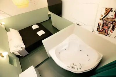 a bathroom with a sink in the middle of it at O Effe Games Vatican in Rome