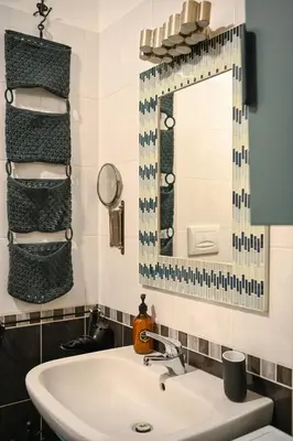 a bathroom with a sink and a mirror at Romina in Rome