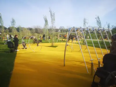 a group of people playing in a park at Maddy House Roma in Rome