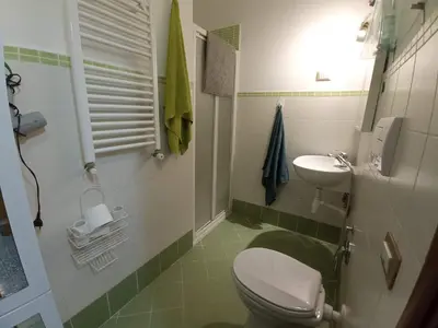 a small bathroom with a toilet and a sink at Bed Bike Breakfast al centro di Roma in Rome