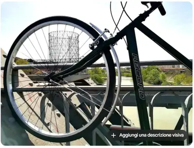 a bike parked next to a bridge with a view at Bed Bike Breakfast al centro di Roma in Rome