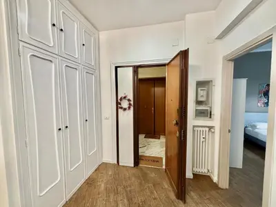a hallway with a door leading to a bedroom at Your Home at Vatican's doors in Rome