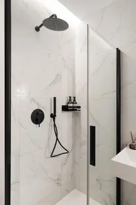a shower with a glass door in a bathroom at Piave Boutique Guest House in Rome