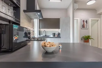 a kitchen with a bowl of food on a counter at San Pietro Panoramic View in Rome