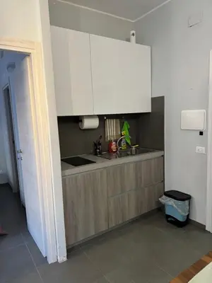 a kitchen with a sink and a counter top at Al 304 a San Giovanni in Rome