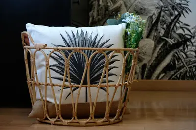 a wicker basket with a pillow on top of it at Gioia House in Rome