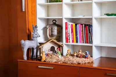 a shelf with a toy house on a dresser at Vatican Blossom in Rome
