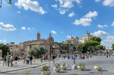 a group of people standing in front of a building at Exentia Stays - Luxury Apartment Colosseum in Rome