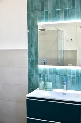 a bathroom with a sink and a mirror at Vatican View Experience in Rome